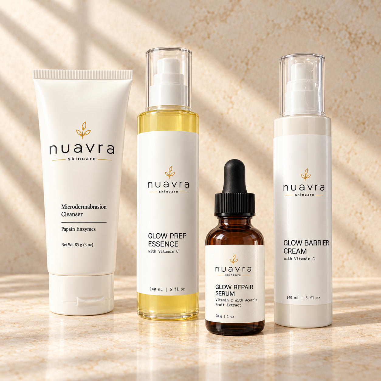 The four nuavra skincare products: Microdermabrasion Cleanser, Glow Prep Essence, Glow Repair Serum, and Glow Barrier Cream